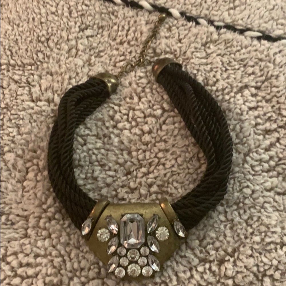 Black rope and crystal necklace.